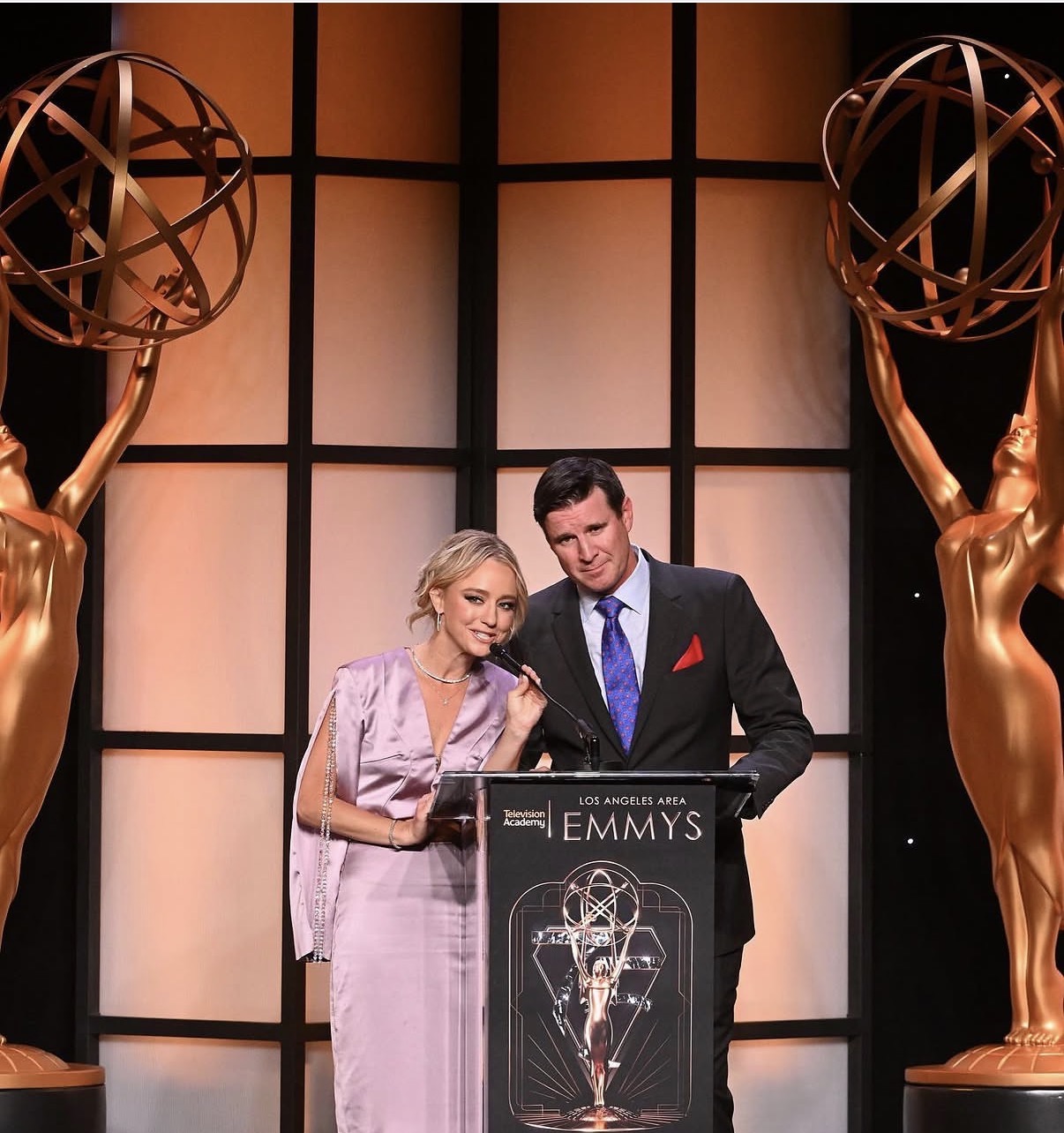 Nikki Kay at the podium at the Los Angeles Area Emmys
